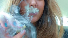 Woman smoke marijuana