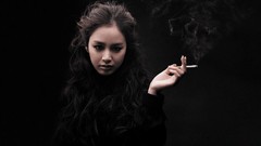 Woman smoking asians brown eyes brunettes