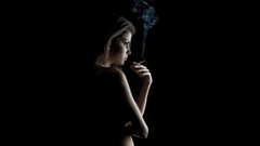 Woman smoking black Cigarettes