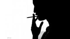 Woman smoking black white