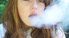 Woman smoking blue eyes