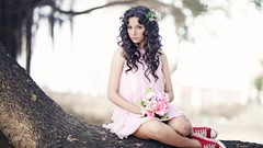 Woman sneakers dress sitting long hair