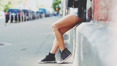 Woman sneakers street roads Shorts legs