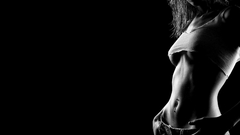 Woman stomach monochrome pierced