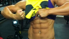 Woman stomach navel muscles bodybuilding fitness boobs abs