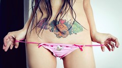 Woman stomach tattoos panties