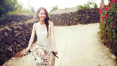 Woman street Bicycles asians smiling brunettes white dress 