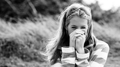 Woman sunglasses grayscale hands on face