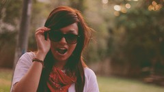 Woman sunglasses open mouth