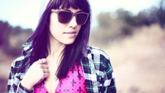 Woman sunglasses tattoos