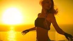 Woman sunlight earphones