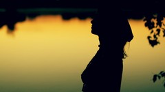 Woman sunset silhouettes