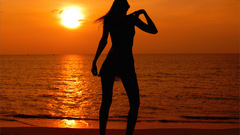 Woman sunset silhouettes Sea
