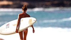 Woman surfing Beaches bikini