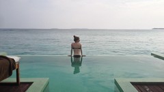 Woman swimming pools