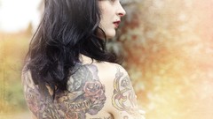 Woman tattoos