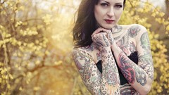 Woman tattoos