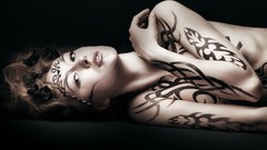 Woman tattoos artistic