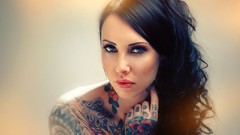 Woman tattoos blue eyes black hair