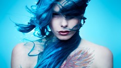Woman tattoos blue hair