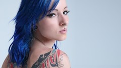 Woman tattoos blue hair piercings W4B magazine
