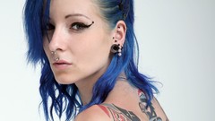 Woman tattoos blue hair piercings W4B magazine
