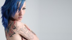 Woman tattoos blue hair piercings W4B magazine