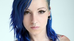 Woman tattoos blue hair piercings W4B magazine
