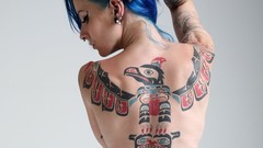 Woman tattoos blue hair piercings W4B magazine haida tattoos