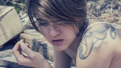 Woman tattoos brunettes piercings