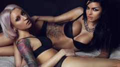 Woman tattoos brunettes piercings