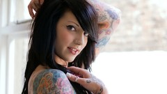 Woman tattoos brunettes piercings