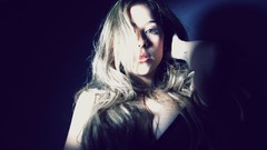 Woman tattoos cleavage