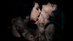 Woman tattoos closed eyes licking piercings lesbians