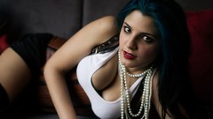 Woman tattoos green hair cleavage necklaces