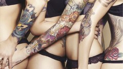 Woman tattoos lingerie