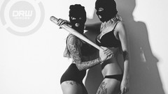 Woman tattoos lingerie baseball bats