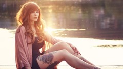 Woman tattoos long hair