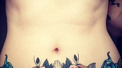 Woman tattoos models boobs