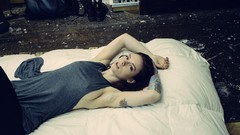 Woman tattoos nipples through clothing