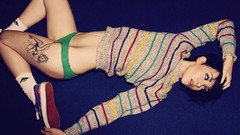 Woman tattoos panties