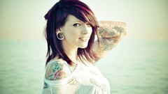 Woman tattoos piercings