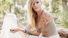 Woman tattoos piercings Lauren