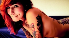 Woman tattoos piercings redheads strategic covering