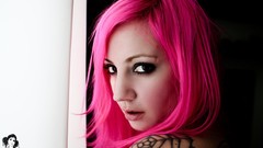 Woman tattoos pink hair magazines nude