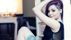 Woman tattoos purple hair