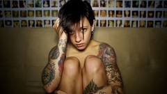 Woman tattoos short hair piercings nude