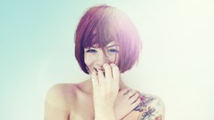 Woman tattoos smiling