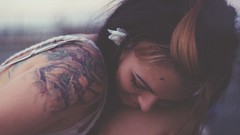 Woman tattoos smiling brunettes