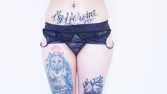 Woman tattoos underwear black panties